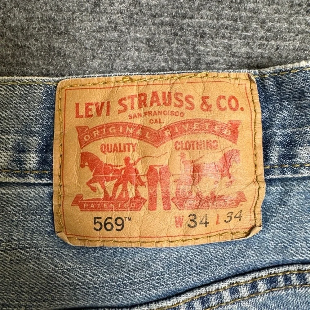 Levi's 569 Loose Straight Jeans Mens 34x33 Medium Wash Blue Denim 100% Cotton